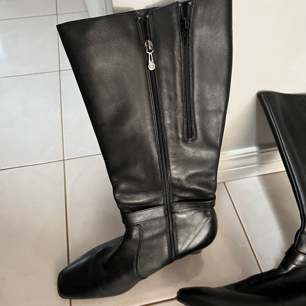 Sleek Black Leather Heeled Boots